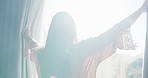 Woman, light and open with curtains in bedroom for morning, stretching or new day in home. Back view, female person or awake with fabric, flare or window for outdoor sunlight, rise and shine in house