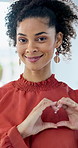 Woman, face and heart hands with fashion designer for love, care or valentines day romance in home. Portrait, female person or tailor with smile, like emoji or shape for romantic gesture or support