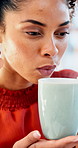 Woman, coffee cup and blow in office with review, project management or documents at company. Person, drink and warm beverage with tea, insight or thinking for solution with career at creative agency