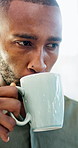Black man, coffee cup and drink in office with review, project management or flavor at company. Person, mug and warm beverage with tea, insight or thinking for solution with career at creative agency
