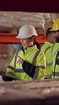 Laptop, logistics and people in factory for delivery, distribution or shipping schedule. Computer, talking and walking with supply chain team in storage plant for inventory or stock management