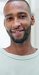 Face, calm and black man in home with happiness, wellness and break on weekend or chill. Casual, confident and cool person with portrait and smile for good mood, free time and comfort in house flare
