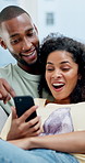 African couple, excited and laugh with phone for social media, meme or bonding in living room. Man, woman and relax with smile on tech for communication, humor or love in home for gossip story