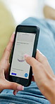 Woman, hands and phone screen with skincare for beauty products, cream or cosmetics in home. Female person, browsing or scrolling online shop with smartphone display, app or menu for dermatology
