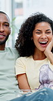 Popcorn, laugh and African couple watching tv on sofa in home with subscription service for bonding. Snack, comedy and man with woman for streaming film, show or series for entertainment and date