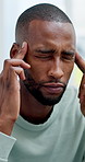 Frustrated, headache and black man with stress for conflict, mistake or disagreement. Fatigue, mental health or male person with depression, anxiety or migraine for discomfort or argument in home