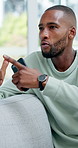 Angry, man and couple with argument on sofa for conflict, fight or living room dispute in home. Frustrated, male person or break up with confession for divorce, separation or cheating affair in house