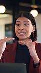 Woman, laptop and meeting at office with discussion, insight or feedback in night at insurance company. Person, broker and explain with computer, solution and proposal at risk management agency