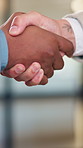 Business, people and shaking hands for real estate agreement, partnership or investment. Property success, deal and commercial agent with handshake for client introduction, meeting or welcome