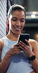 Fitness, smile and woman with phone at tennis court, tutorial and beginner advice on practice break. Sports club, reading and person with online booking for padel class, training pause and mobile