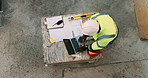 Construction site, laptop and above of man for planning, building design and inspection. Civil engineering, supervisor and person with documents and tech for floorplan, blueprint and infrastructure