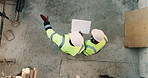 Construction, talking and above of men with blueprint for planning, building project and renovation. Civil engineering, teamwork and people with paperwork for floorplan, design and infrastructure