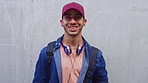 Face, man and student with smile outdoor for education, scholarship and study abroad. Wall, portrait or male person with mockup space, learning opportunity and positive attitude for college knowledge