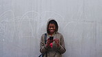 Outdoor, student and black woman laughing with phone, reading college newsletter and funny message. Internet humor, space and happy person with mobile by wall, web chat notification and joke in forum