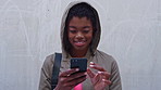 Wall, student and black woman laughing with phone, reading college newsletter and funny message. Internet humor, space and happy person with mobile for web chat notification, outdoor or joke in forum