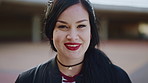 Outdoor, face or woman with laugh for education, university student or pride for study opportunity. Portrait, confident or happy scholar with knowledge development for scholarship, campus or learning