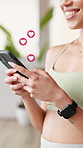 Social media, hands and woman with phone emoji for love, online dating and overlay at fitness gym. Happy person, mobile and typing with heart symbol, icon and romantic update with notification on app