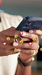 Emoji, typing and hands of woman with phone for social media, internet and online chat with icons. Reaction, symbols and person on cellphone for contact, communication and networking on mobile app