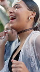 Excited, woman and dance with people at music festival for fun, celebration or energy at live concert. Happy, female person and groove with crowd, freedom and moving with rhythm at outdoor rave party