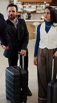 Hotel, handshake and business people in lobby with concierge for check in, reservation and welcome. Travel, hospitality and guests with luggage for booking, work trip and conference at front desk