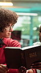People, podcast and bible with mic in studio for recording, Christian radio station or scripture reading. Woman, man and book with religion, faith or discussion with storytelling for content creation