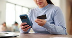 Phone, hands and woman with credit card in home for online shopping, payment and website store. Happy, ecommerce and person on smartphone for transaction, digital purchase and sale with bank app