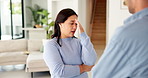 Frustrated, couple and fight with stress in home for conflict or living room dispute. Upset, woman and disagreement with man, argument or mistake for poor communication, cheating affair or confession