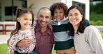 Happy, face and hug with family for real estate, property ownership or new home together. Portrait, mom and dad with children, smile or embrace for house investment, safety and security in backyard