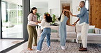 Happy, dancing and parents with children in home for bonding with music, energy and playful. Family, excited and kids in living room with mom, dad and holding hands for moment, relationship and love