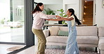 Happy, dancing and mom with child in home with spin for bonding, playful relationship and movement. Family, love and mother with girl with music, energy and together for connection, moment and fun