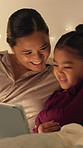 Happy, tablet and mother with child in home at night with choice on movie, show or series online. Relax, digital technology and mom with girl kid with streaming film on app together in apartment.