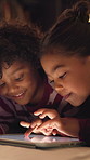 Relax, tablet and kids in bedroom at house at night with choice on movie, show or series online. Happy, digital technology and children with streaming film on app, website or internet in apartment.