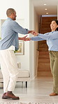 Happy, dance and couple in home with music, fun or bonding together in living room with energy. Smile, love and man with woman for moving to playlist, album or radio for entertainment in apartment