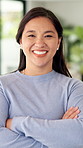 Face, woman and smile with arms crossed in home for weekend break, peaceful or confident on day off. Relax, asian person and laughing in house for wellness, positive attitude or good mood for me time