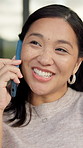 Happy, talking and asian woman with phone call in home for communication, connection or chat. Internet, smile and  person on mobile for casual interaction, discussion or conversation of weekend plans