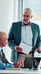 Meeting, conversation and business people with laptop in office for problem solving, company audit or report. Mature person, financial agency and proposal with document, decision and investment plan