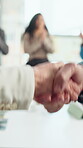 People, clapping and shaking hands in meeting for celebration, success or business deal. Collaboration, partnership and group applause with handshake for b2b goal, agreement or thanks in office