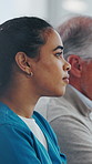 Nurse, woman and listen in hospital with workshop, medical internship or thinking for seminar tips. Healthcare, intern and people in clinic with training meeting, knowledge or advice for development.