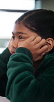 Bored, education and quiz with girl in classroom for test, child development and fatigue. Burnout, assessment and academy with student on school campus for brain fog, course curriculum and exam