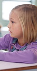 Stress, education and quiz with girl in classroom for test, child development and knowledge. Time management, issue and anxiety with student on school campus for learning, course curriculum and exam