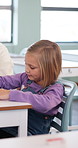 Help, education and quiz with girl in classroom for test, child development and knowledge. Teacher, assessment and academy with student on school campus for learning, course curriculum and exam