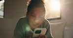 Relax, typing or phone with teenager on bed for social media, communication or connection in home. Child, kid or girl lying with smile, lens flare or mobile smartphone for online chatting or texting