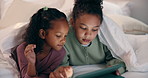 Love, sisters and happy with tablet on bed for cartoon search, streaming options or relationship. Family, girl children or blanket with tech in home for online film, series choice or bonding together
