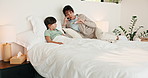Phone call, sick and mom with child in bed for concern with temperature, fever and symptoms. Family, home and mother with girl on cellphone for virus, viral infection and telehealth consultation