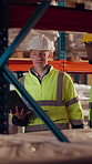 Laptop, logistics and people in warehouse for delivery, distribution or shipping schedule. Computer, conversation and walking with supply chain team in storage depot for inventory or stock management