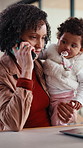 Remote work, phone call and mom with baby in home for contact, client chat and conversation. Family, wfh and woman with child on laptop for multitasking with project update, talking and communication