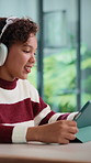 Girl, tablet and headphones with education in home for project, talk and online course. Child, virtual class and audio with e learning, application and attention for development on web at house