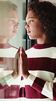 Thinking, sad and child by window in home with reflection for bad memory, mistake and lonely. House, unhappy and young girl with emotions, thoughtful and wondering for trauma, worry and crisis