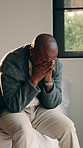 Thinking, stress and black man in home with regret, mistake or reflection on bad news with guilt. Mental health, upset and mature African person with anxiety for nostalgia, fail or doubt in house.