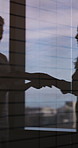 Window, shaking hands and business people in office with meeting, agreement or finance partnership. Shadow, deal and financial manager shaking hands with client for investment contract in workplace.